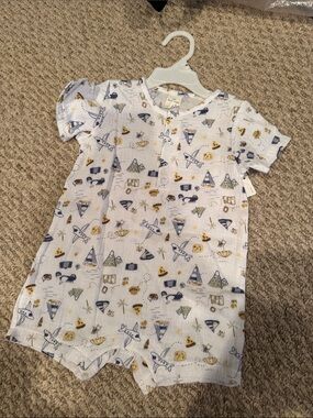White Short-Sleeve Baby Romper with Travel Print